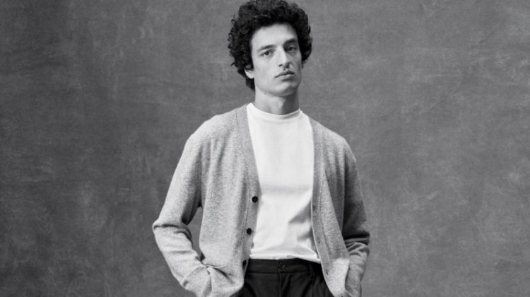 Gabriel Pitanga models a Brayden cashmere cardigan, authentic Supima t-shirt, and Signature Italian Hopsack wide-leg pants from the Banana Republic BR Classics collection.