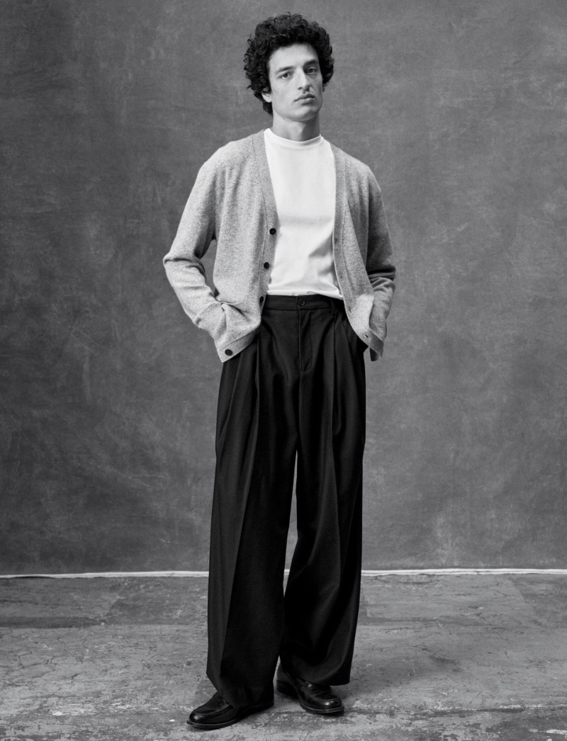 Gabriel Pitanga models a Brayden cashmere cardigan, authentic Supima t-shirt, and Signature Italian Hopsack wide-leg pants from the Banana Republic BR Classics collection. 