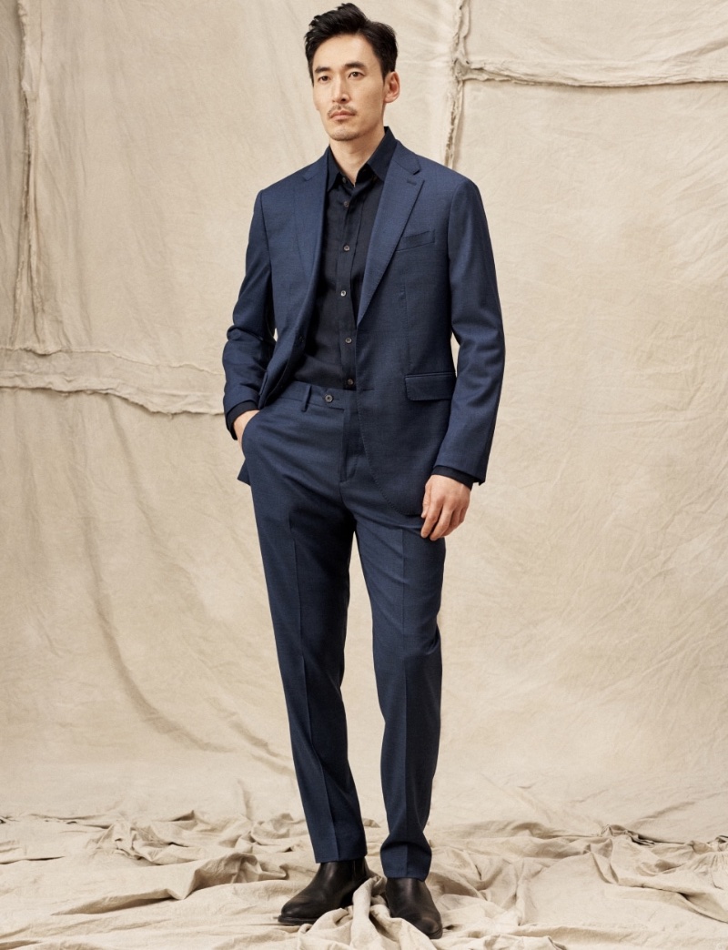 Jino Chun dons a Banana Republic Signature Italian Nailhead suit jacket and pants from the brand's BR Classics collection.
