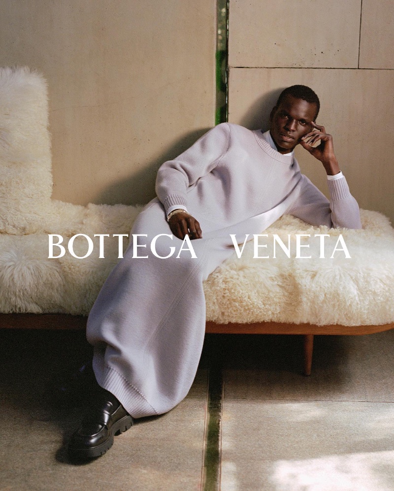 Badhiel Lony wears a long knit for Bottega Veneta's fall-winter 2023 campaign.