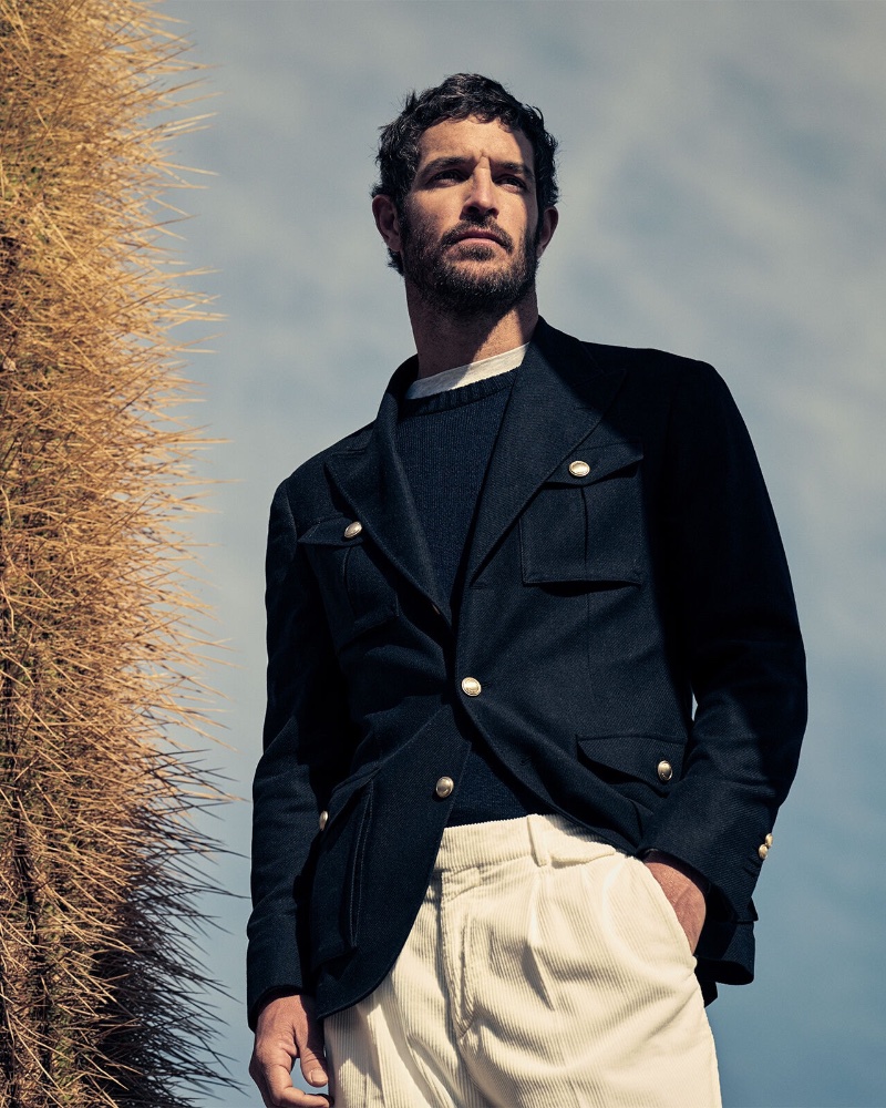 Justice Joslin dons a Brunello Cucinelli blazer with a cashmere sweater and corduroy trousers.