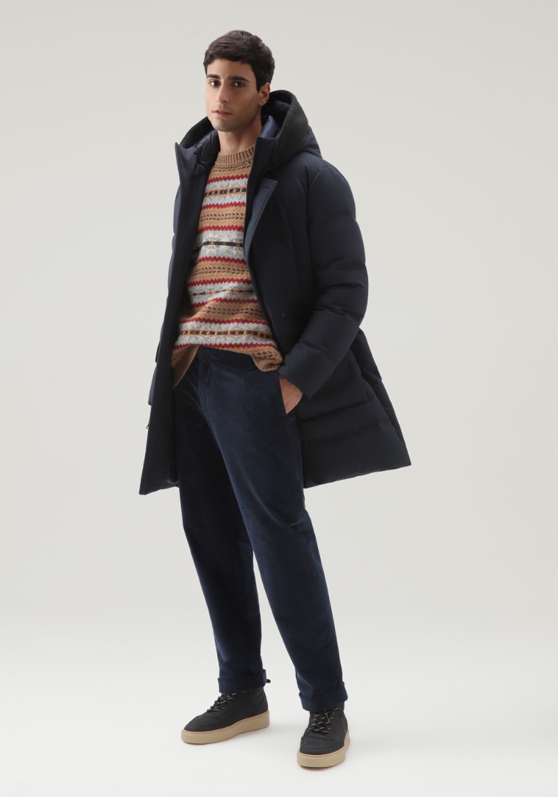 Beloved heritage brands like Woolrich offer time-tested classics like the down puffer coat. 
