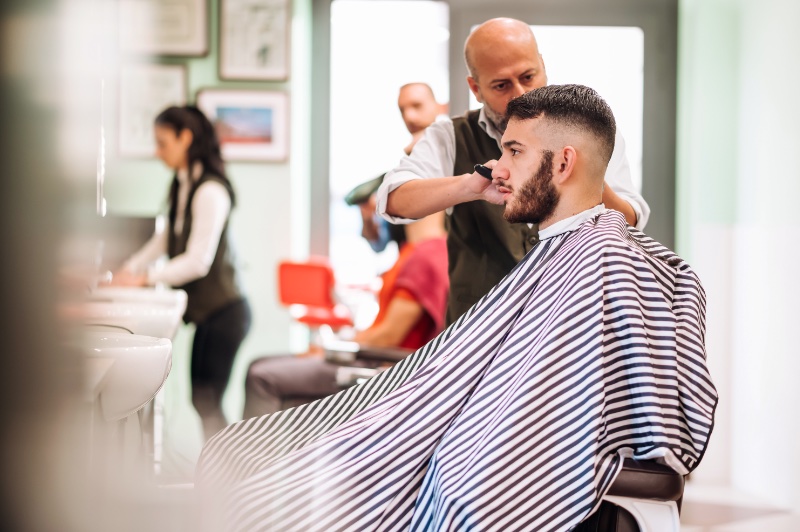Confident man with a chiseled jawline and stylish haircut