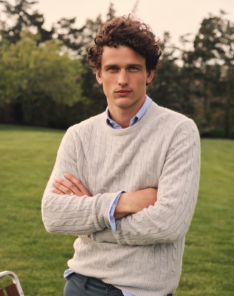 Simon Nessman wears a J.Crew cashmere cable-knit sweater with a broken-in organic cotton oxford.