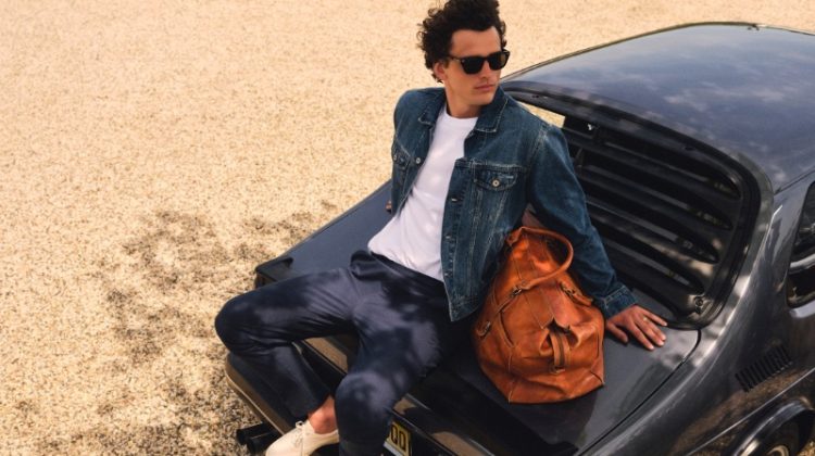 Going casual, Simon Nessman rocks a J.Crew denim jacket with a relaxed premium-weight cotton tee and a Tech Dock pant.