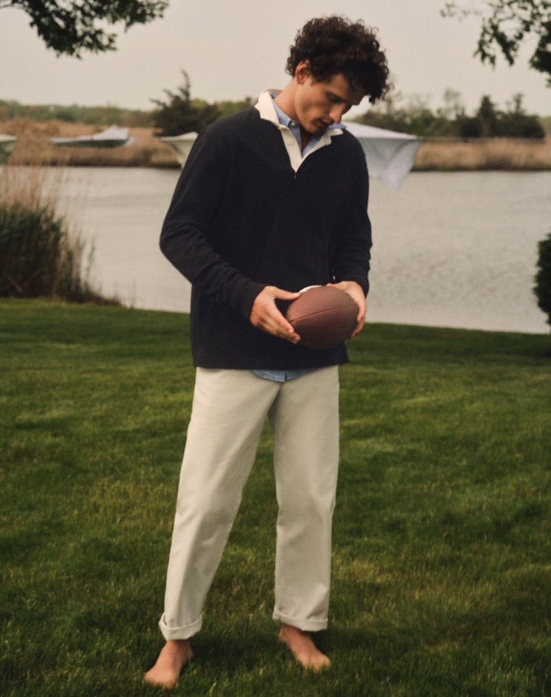 Embracing classic men's style, Simon Nessman dons a J.Crew rugby shirt with a Secret Wash cotton poplin shirt and a Classic chino.