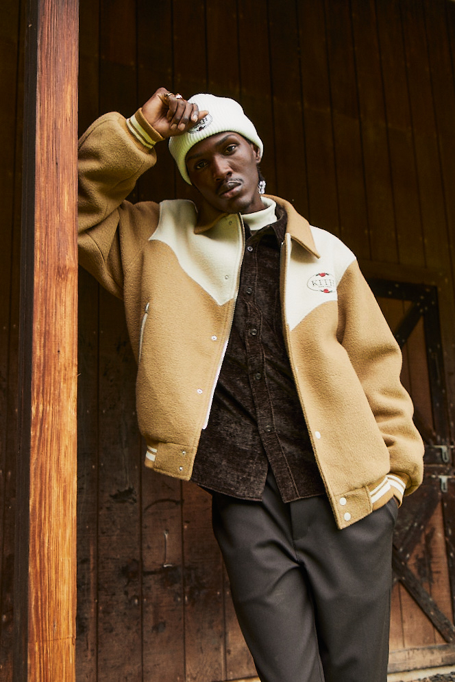 Anarcius Jean models an outfit from Kith's fall 2023 collection.