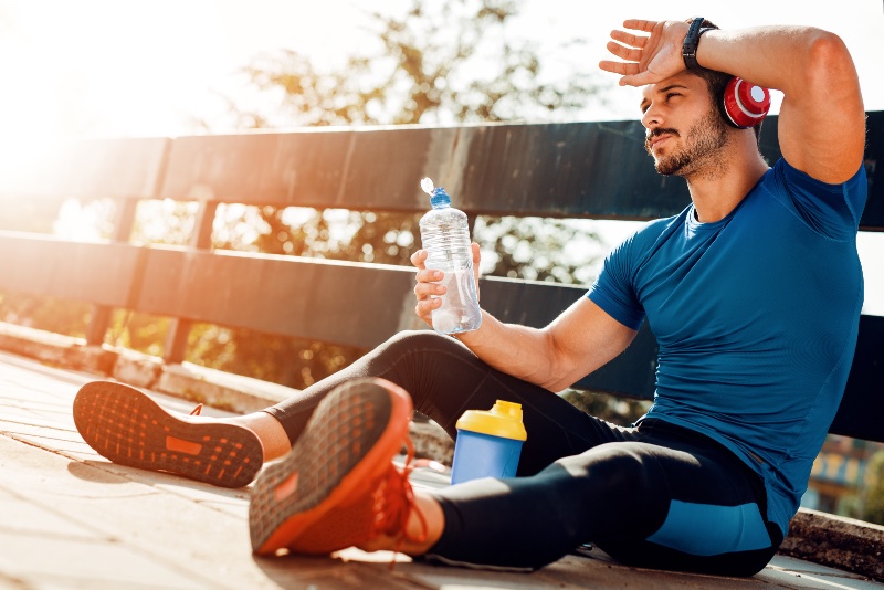 Man Drinking Water Post Workout Man Drinking Water Post Workout