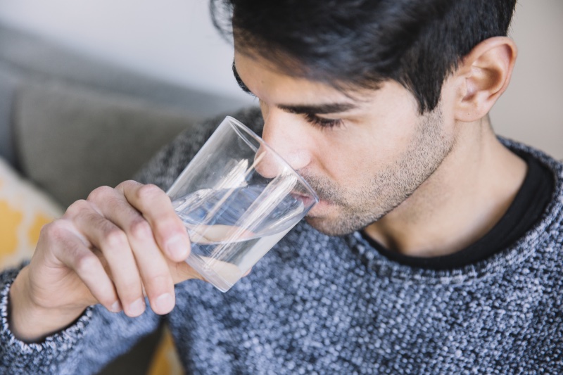 Man Drinking Water