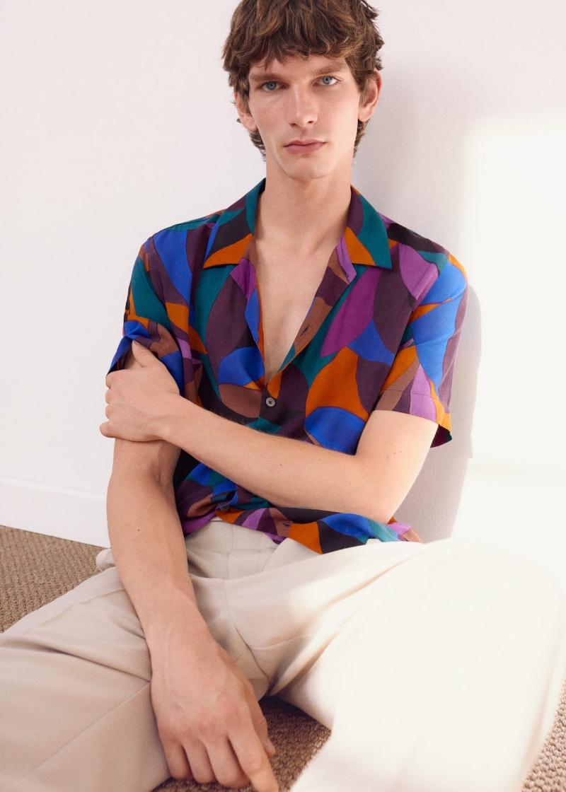 Erik van Gils sports a Mango geometric-print bowling shirt.