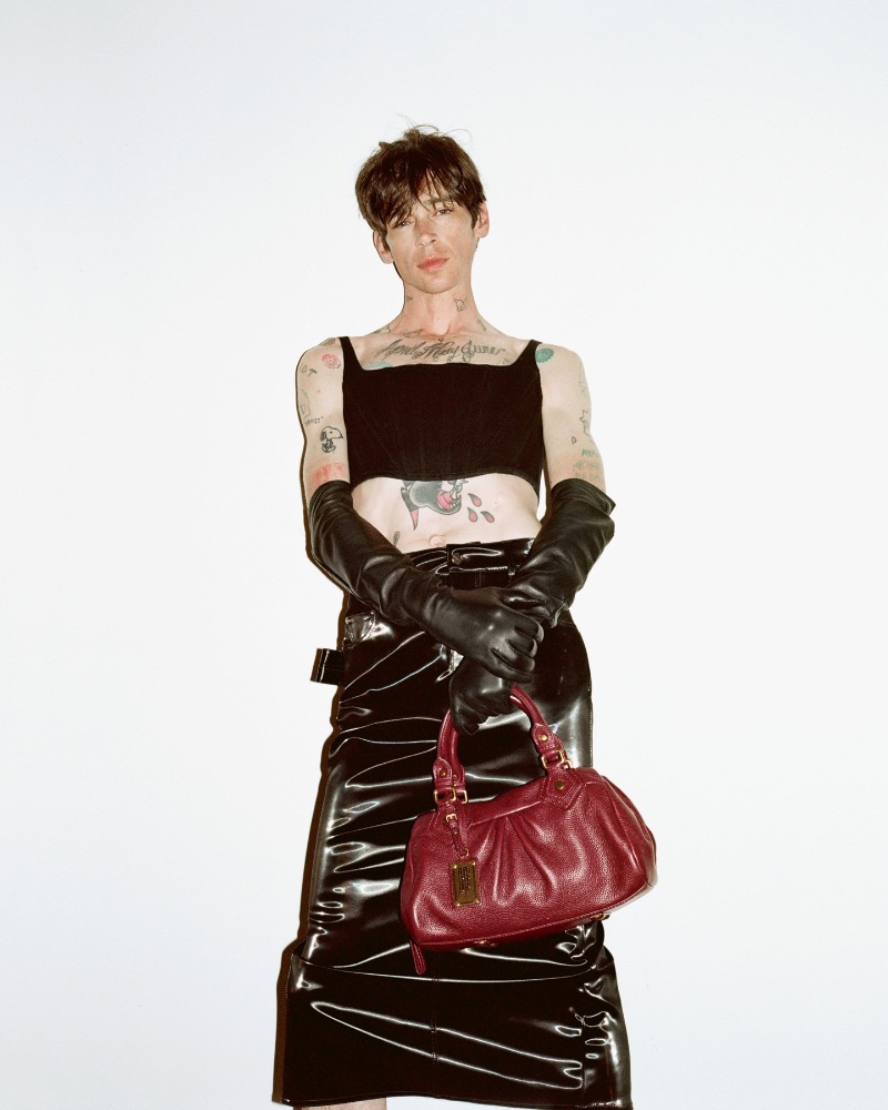 Marc Jacobs enlists Cole Mohr to fronts its Re-edition campaign featuring the Baby Groovee Bag. 