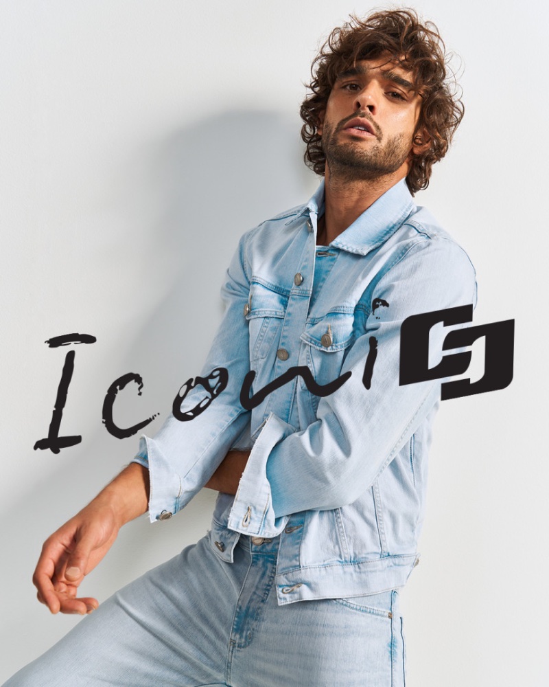 Sporting double denim, Marlon Teixeira appears in Colcci's spring 2024 campaign. 