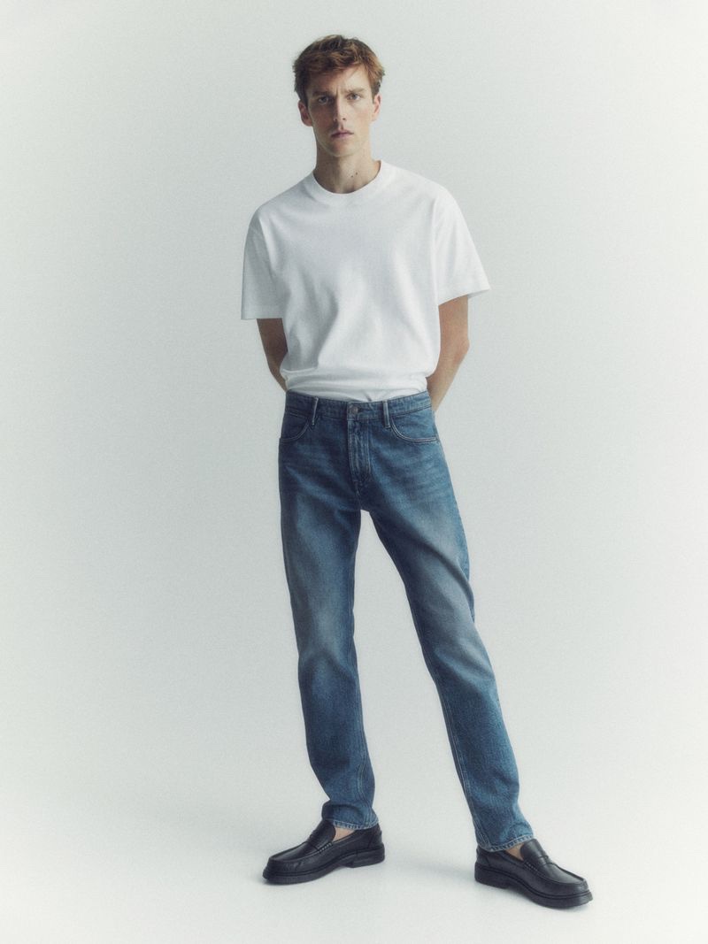 In front and center, Quentin Demeester sports classic blue jeans with a white t-shirt. » Massimo Dutti Fall 2023 Denim: Simply Timeless In front and center, Quentin Demeester sports classic blue jeans with a white t-shirt.