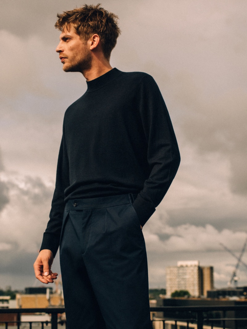 Baptiste Radufe wears a mock neck sweater with pleated trousers from Massimo Dutti's fall-winter 2023 Studio collection. » Massimo Dutti Studio Captures Urban Elegance This Fall Baptiste Radufe wears a mock neck sweater with pleated trousers from Massimo Dutti's fall-winter 2023 Studio collection.