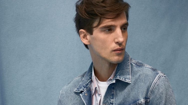 Model Anatol Modzelewski takes the spotlight in a jean jacket paired with a striped shirt from Pepe Jeans.