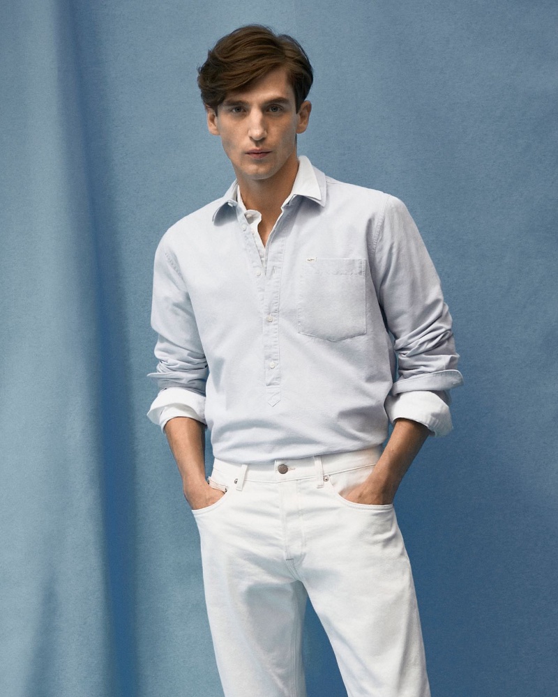 Embracing light summer tones, Anatol Modzelewski wears white denim jeans from Pepe Jeans.