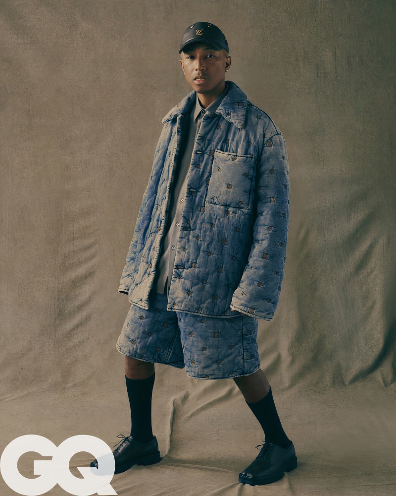 Starring in a GQ photoshoot, Pharrell Williams rocks a Louis Vuitton outfit with an Auralee shirt, Maison Margiela shoes and Falke socks.