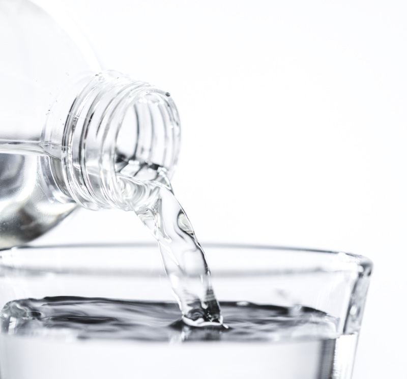 Pouring Water in Glass