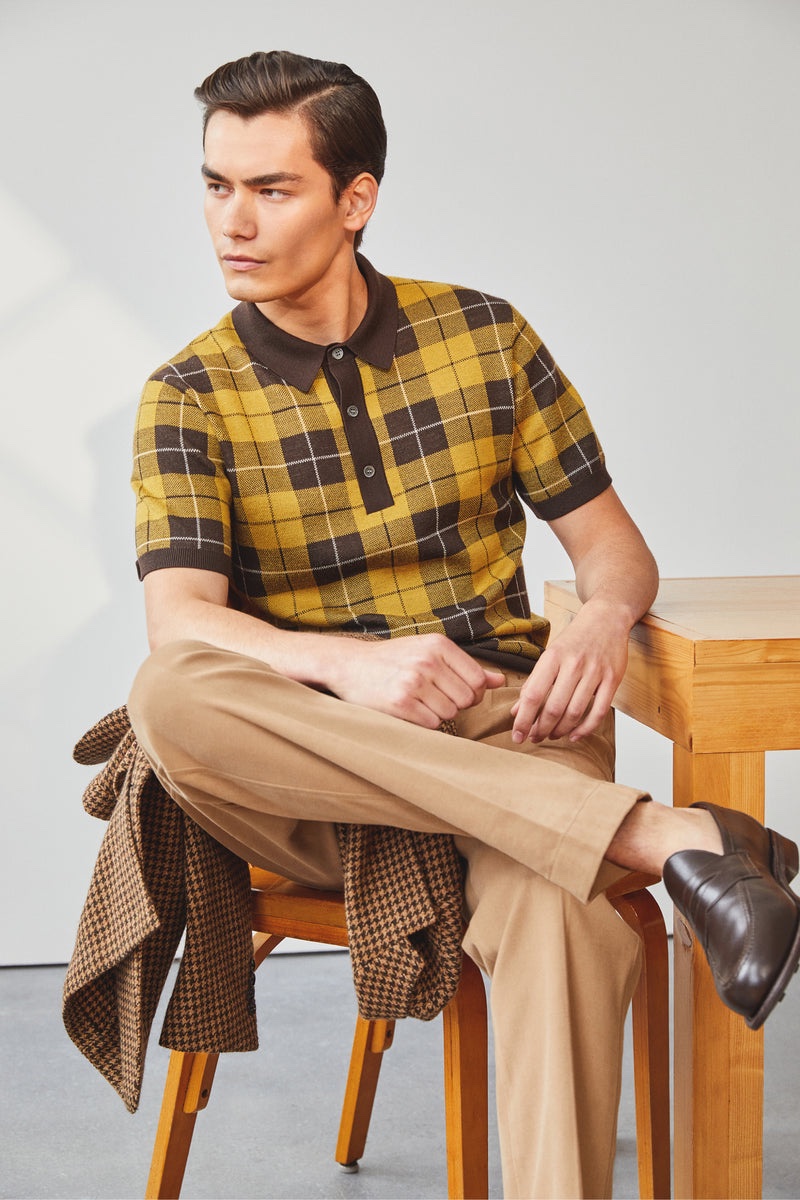 Takezo Shimizu wears a Todd Snyder plaid Merino polo, Italian brushed cotton Gurkha trousers, and Sanders x Todd Snyder loafers. Photo: Todd Snyder