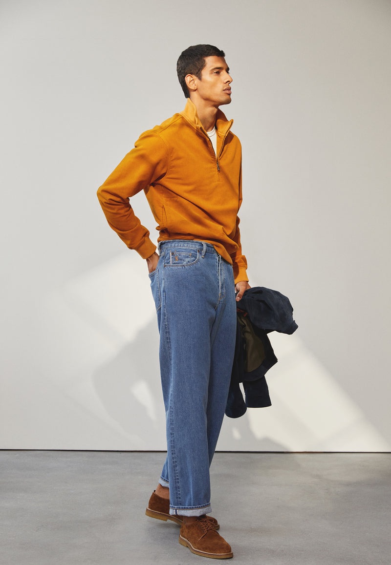 Jonas Barros wears a Todd Snyder moleskin half-zip pullover, Made in L.A. homespun slub pocket t-shirt, relaxed fit selvedge jeans, and Sanders x Todd Snyder Archie lace-up shoes. » Todd Snyder Fall 2023: New Arrivals Boast Transitional Style Jonas Barros wears a Todd Snyder moleskin half-zip pullover, Made in L.A. homespun slub pocket t-shirt, relaxed fit selvedge jeans, and Sanders x Todd Snyder Archie lace-up shoes.