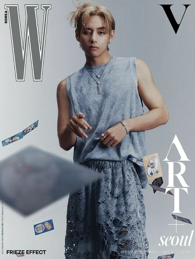 Covering W Korea, BTS' V goes casual in a deconstructed gray outfit by Diesel, accessorized with Cartier jewelry.
