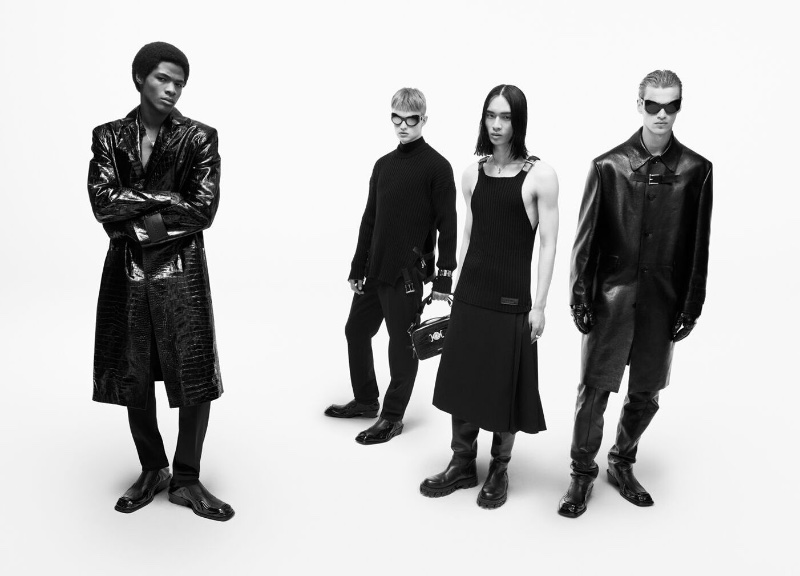 Versace unveils its fall-winter 2023 campaign with models Wylber Flores Marte, Mattias Akke, Donggyu Lee, and Filip Hrivnak.