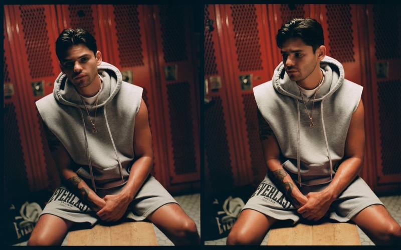 Wearing the Zara x Everlast collection, Ryan Garcia rocks a sleeveless sweatshirt with jogger shorts. 