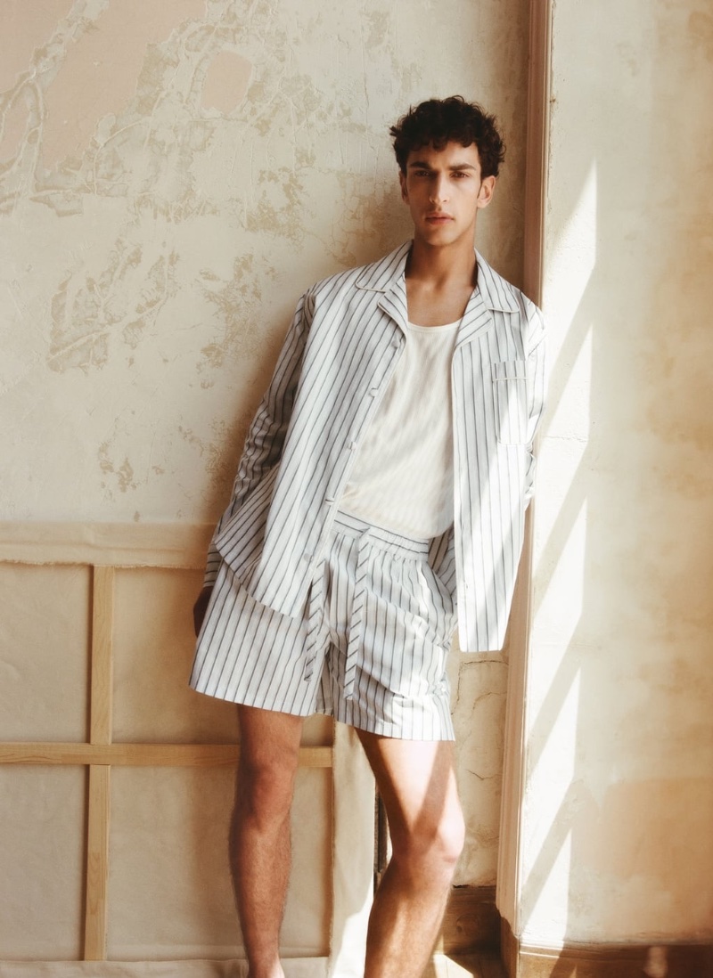 Making a case for CO-ORD style, Habib Masovic wears a pinstripe short set. 
