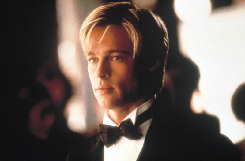 Brad Pitt dons a popular curtain hairstyle in 1998's Meet Joe Black. 