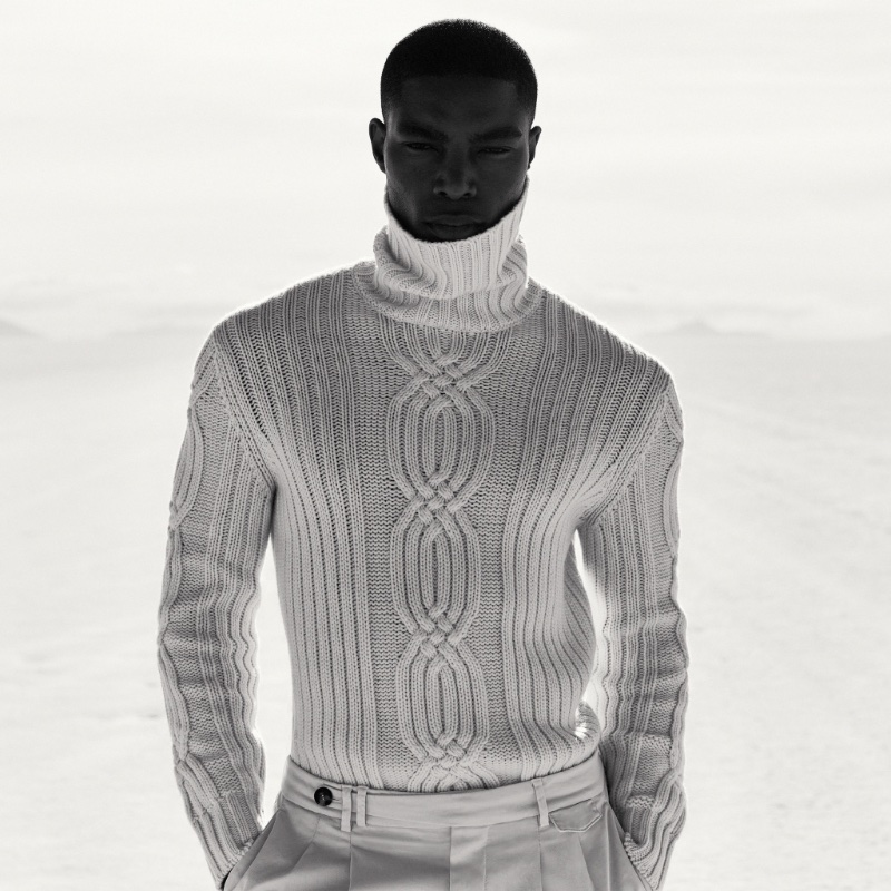 Donning a chic turtleneck sweater, Niyo Malik appears in Brunello Cucinelli's fall-winter 2023 campaign. 