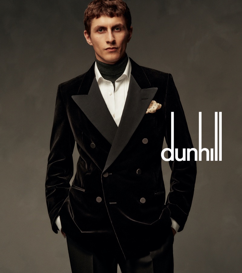 Henry Kitcher dons a double-breasted velvet jacket for Dunhill's fall-winter 2023 campaign.