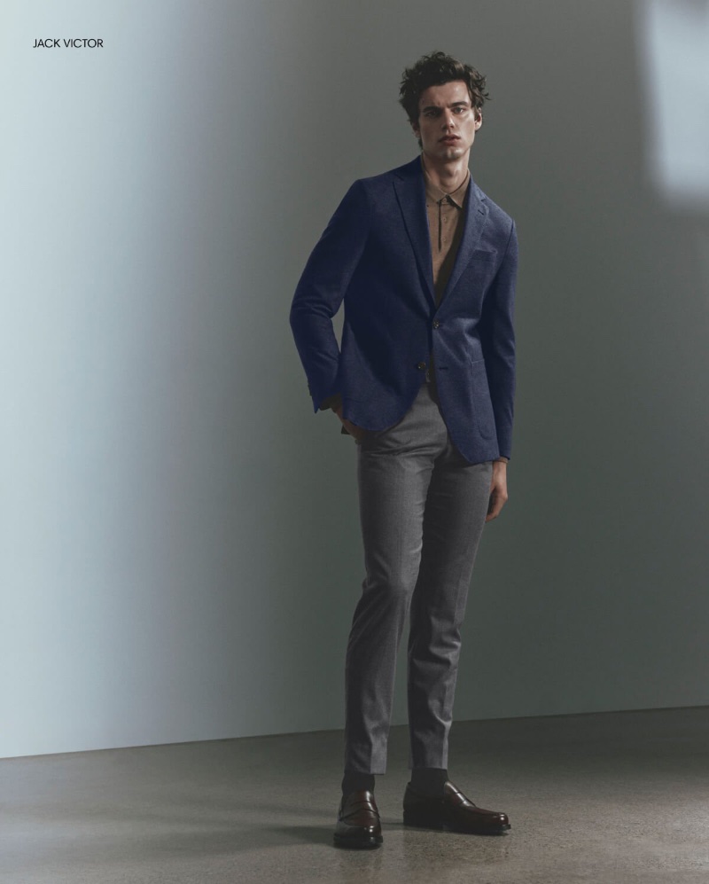 Donning slim-fit tailoring, Pablo Kaestli sports a Jack Victor look.