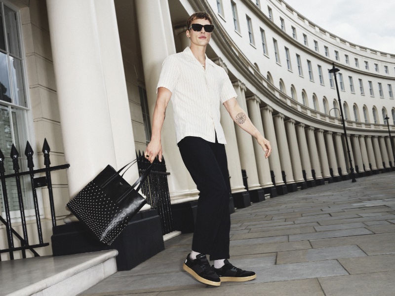 Sporting Jimmy Choo's Florent sneakers and holding a Pimlico studded tote, Charlie Florence appears in Jimmy Choo's fall 2023 campaign. » Jimmy Choo Fall 2023 Campaign: The Modern Classic Sporting Jimmy Choo's Florent sneakers and holding a Pimlico studded tote, Charlie Florence appears in Jimmy Choo's fall 2023 campaign.
