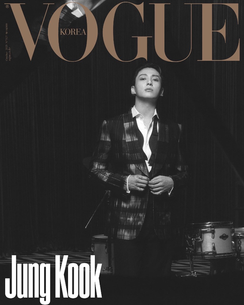Jung Kook channels the jazz era in a Ralph Lauren Purple Label plaid blazer for the October 2023 cover of Vogue Korea.