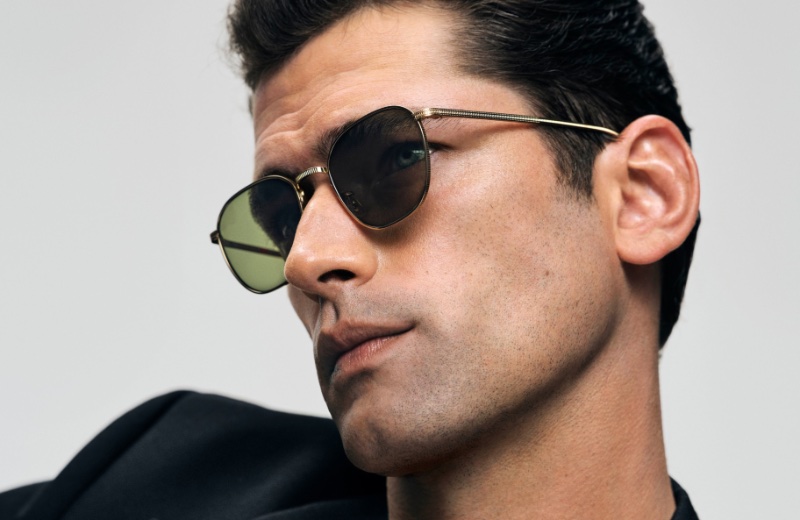 Sean O'Pry sports Oliver Peoples' Rynn sunglasses for the brand's fall 2023 campaign.
