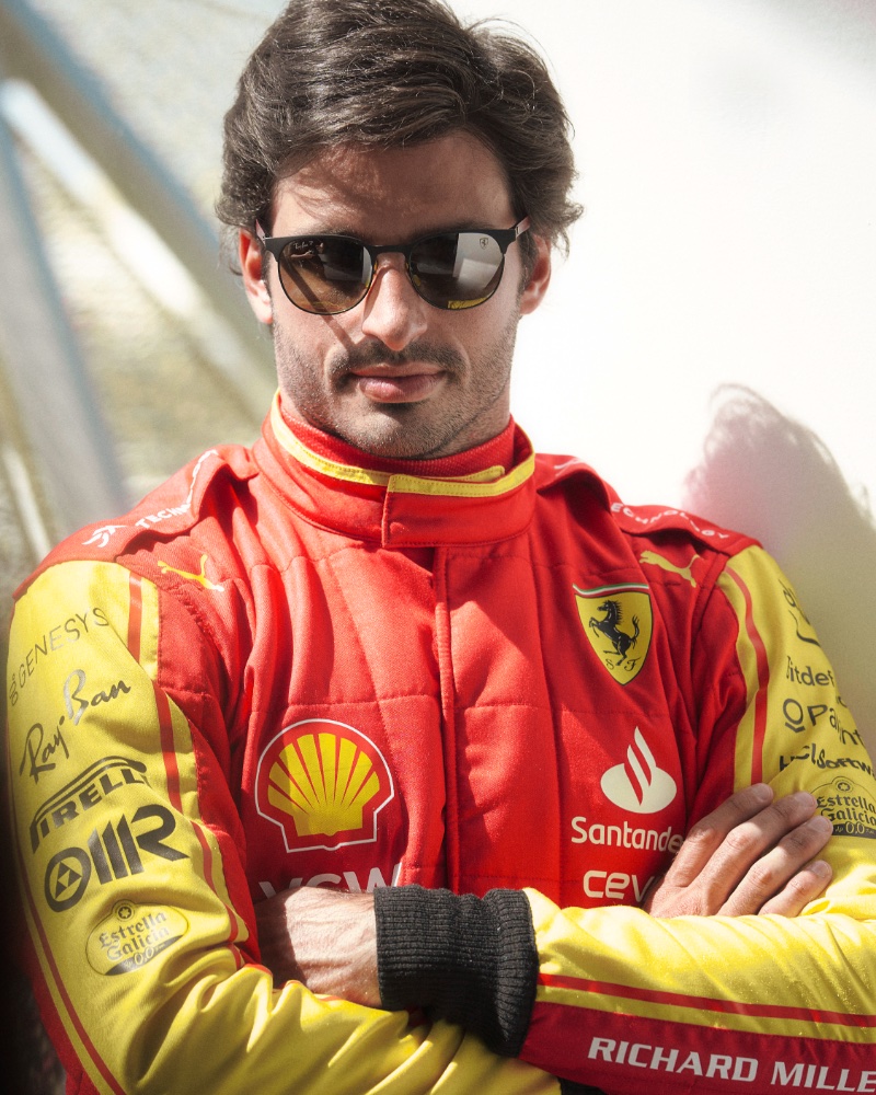 Race car driver Carlos Sainz Jr. takes the spotlight in Ray-Ban x Scuderia Ferrari Monza sunglasses.