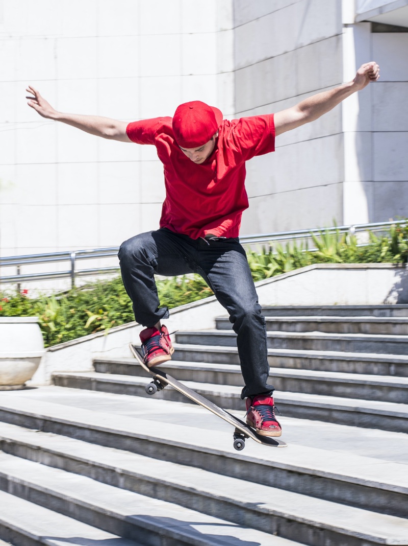 Skater Red T-Shirt Cap Skate Shoes Jeans