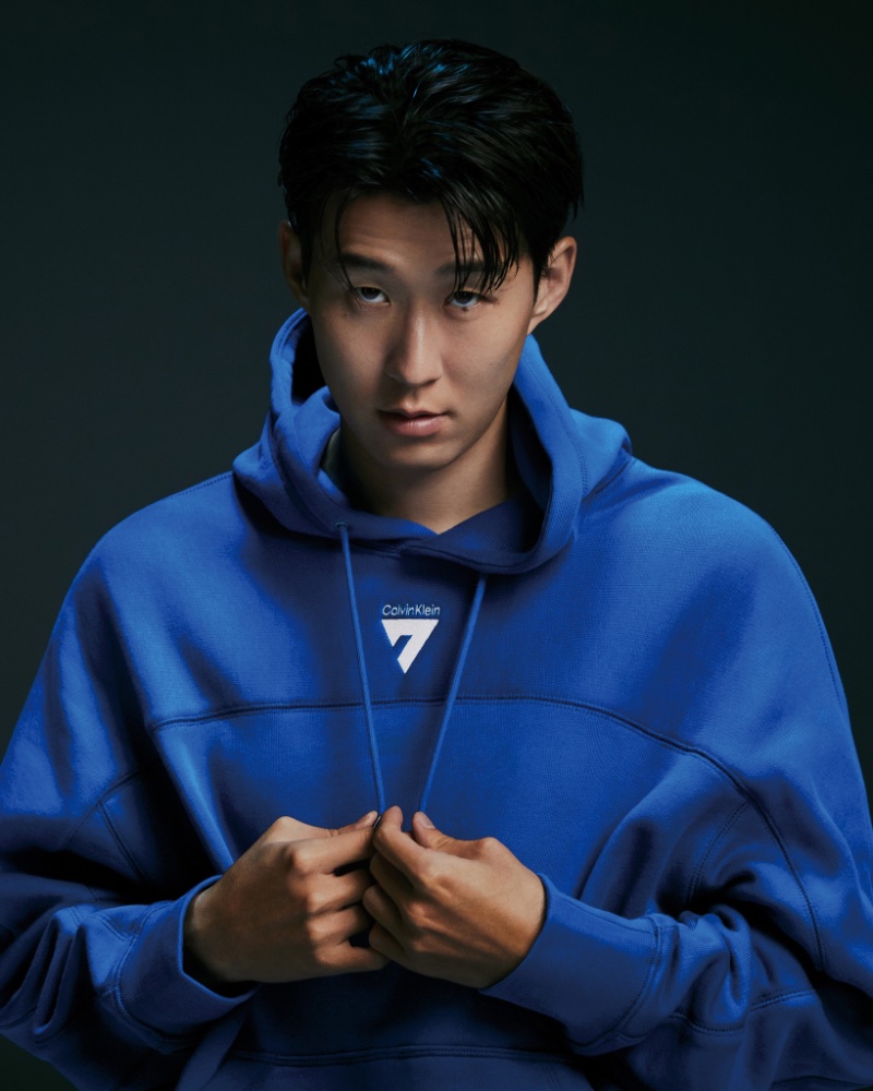 Soccer star Son Heung-min sports a limited-edition Calvin Klein hoodie with his number 7 as part of the logo.