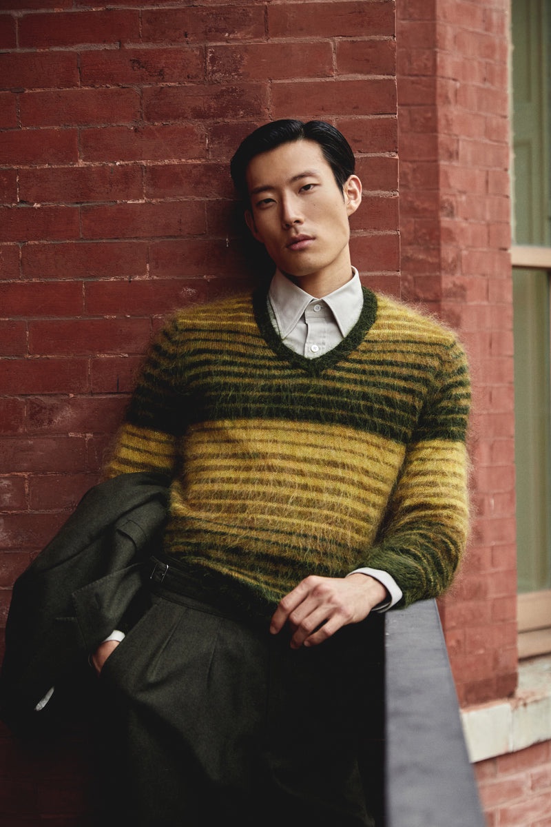 Add texture to your fall wardrobe with Todd Snyder's horizontal stripe mohair v-neck sweater. Juhyung Kang models the knit with a Hamilton + Todd Snyder shirt and Todd Snyder Italian flannel Gurkha trousers