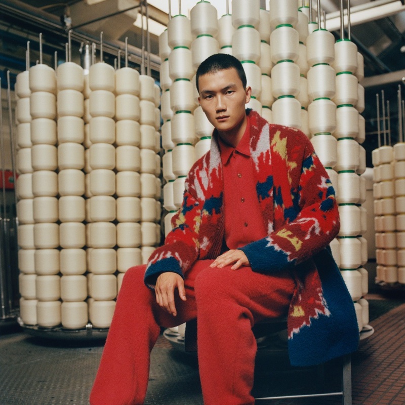 Ryan Park stands out in a red number for the Zegna x The Elder Statesman fall-winter 2023 campaign.