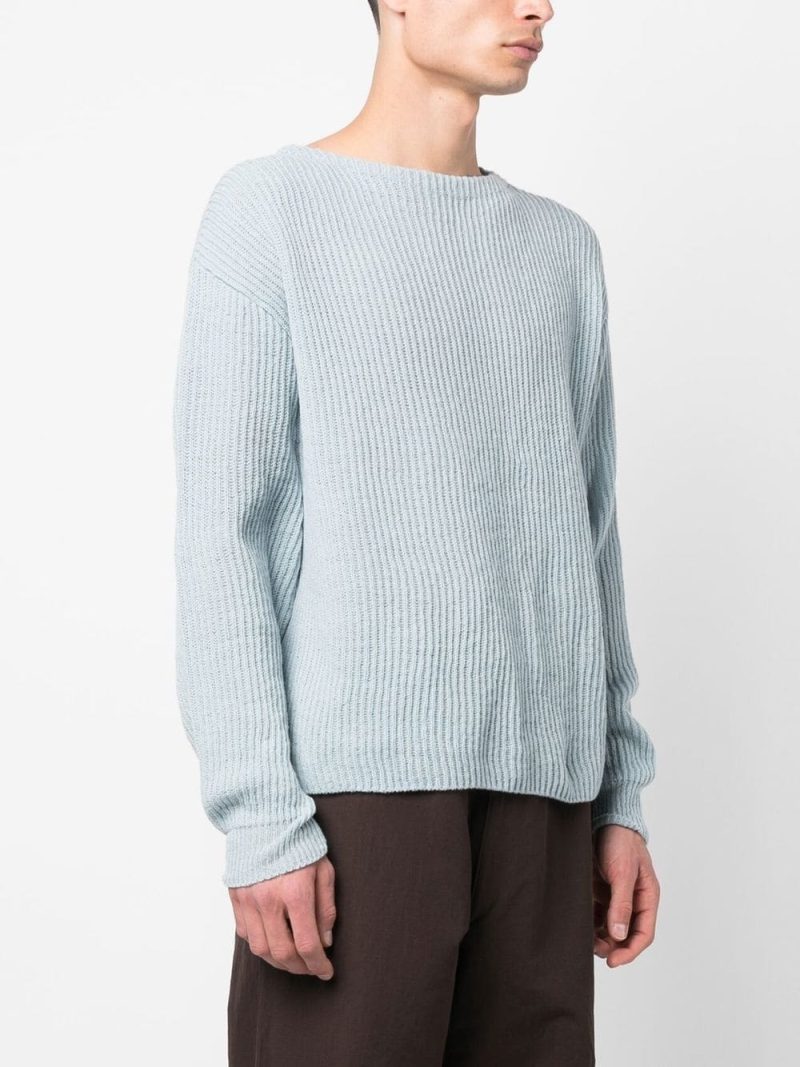 Make a pastel play in a baby blue sweater. 