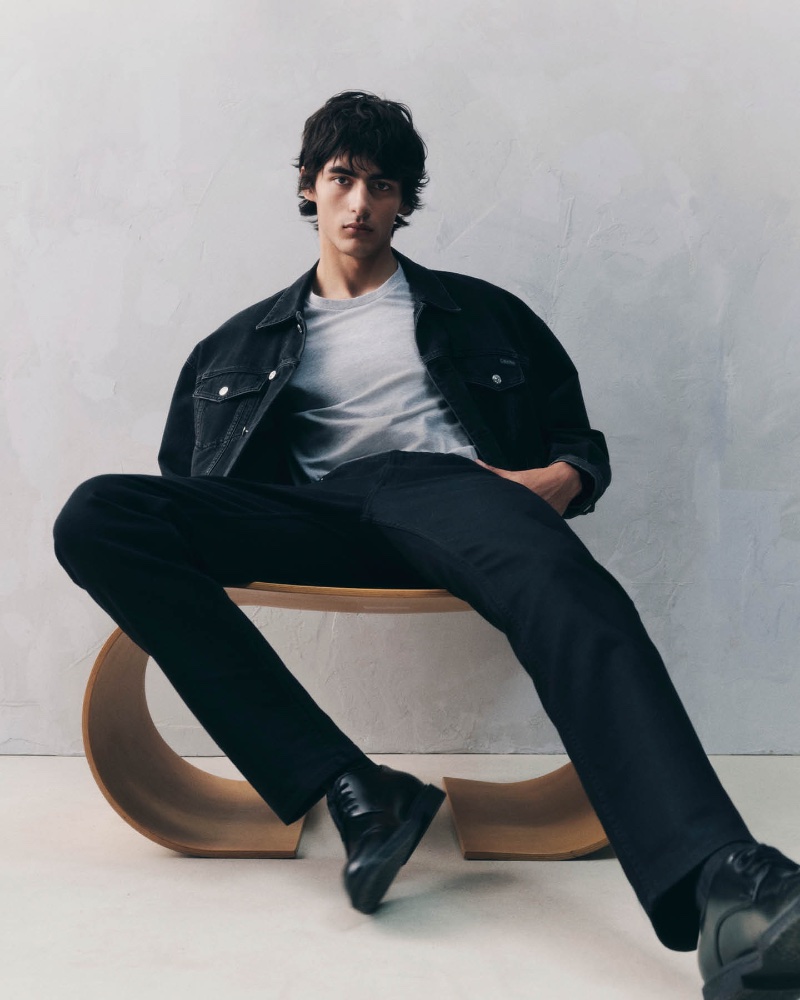 Akbar Shamji appears in Calvin Klein's fall-winter 2023 essentials campaign, sporting an iconic trucker jacket.
