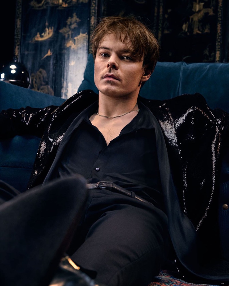 Charlie Heaton wears all black, including a sequined jacket for Rabanne's Phantom Parfum campaign. 
