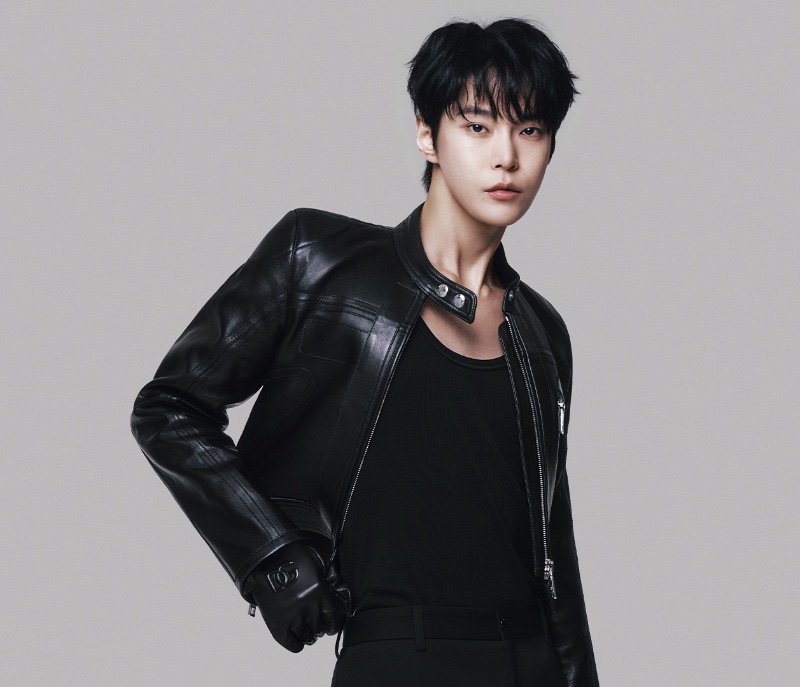 Exuding a timeless cool, Doyoung rocks a black leather jacket for Dolce & Gabbana's fall-winter 2023 advertising campaign.
