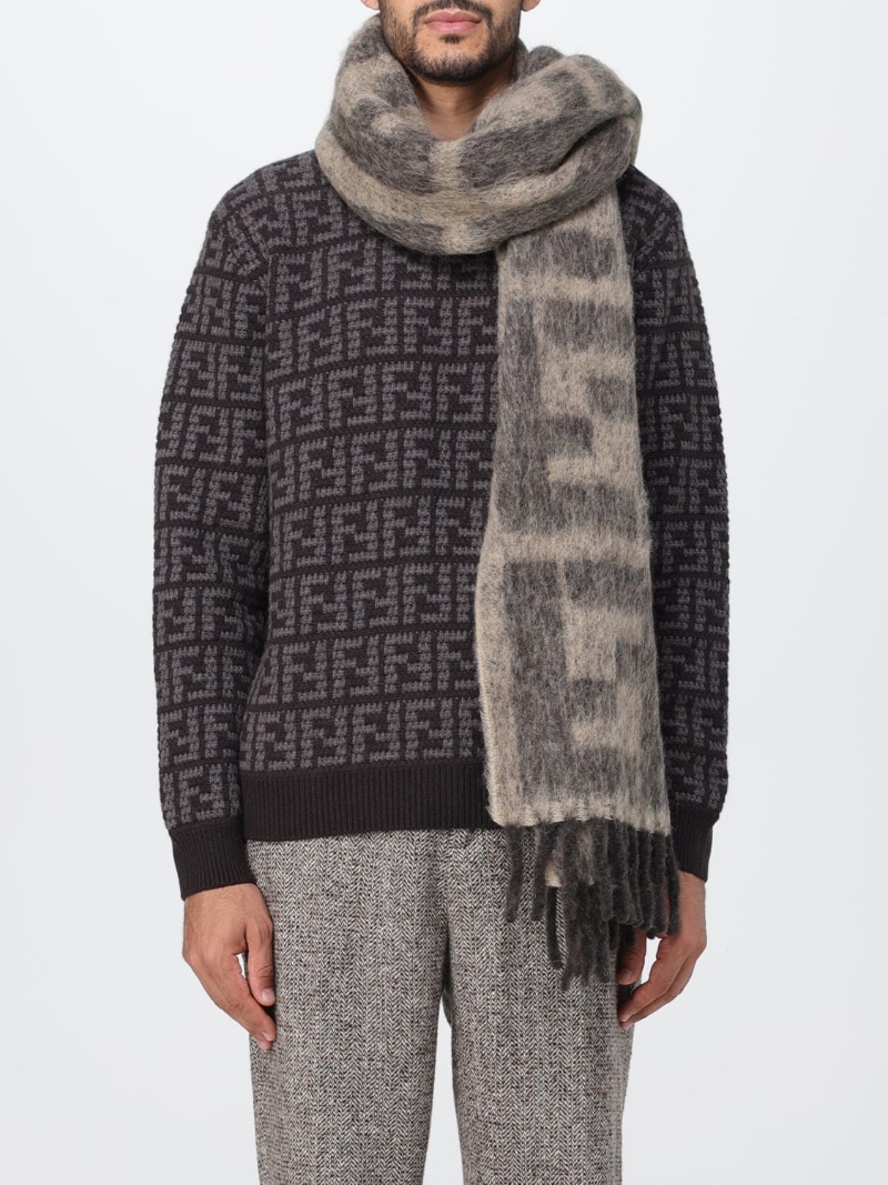 Scarves like this oversized style by Fendi bring equal parts style and function.
