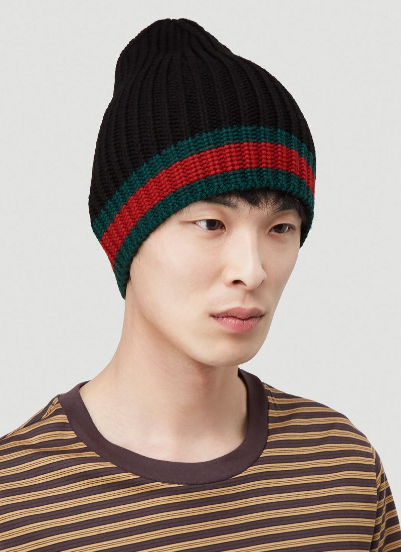 Keep your head warm and stylish in a knit beanie from the likes of Gucci. 