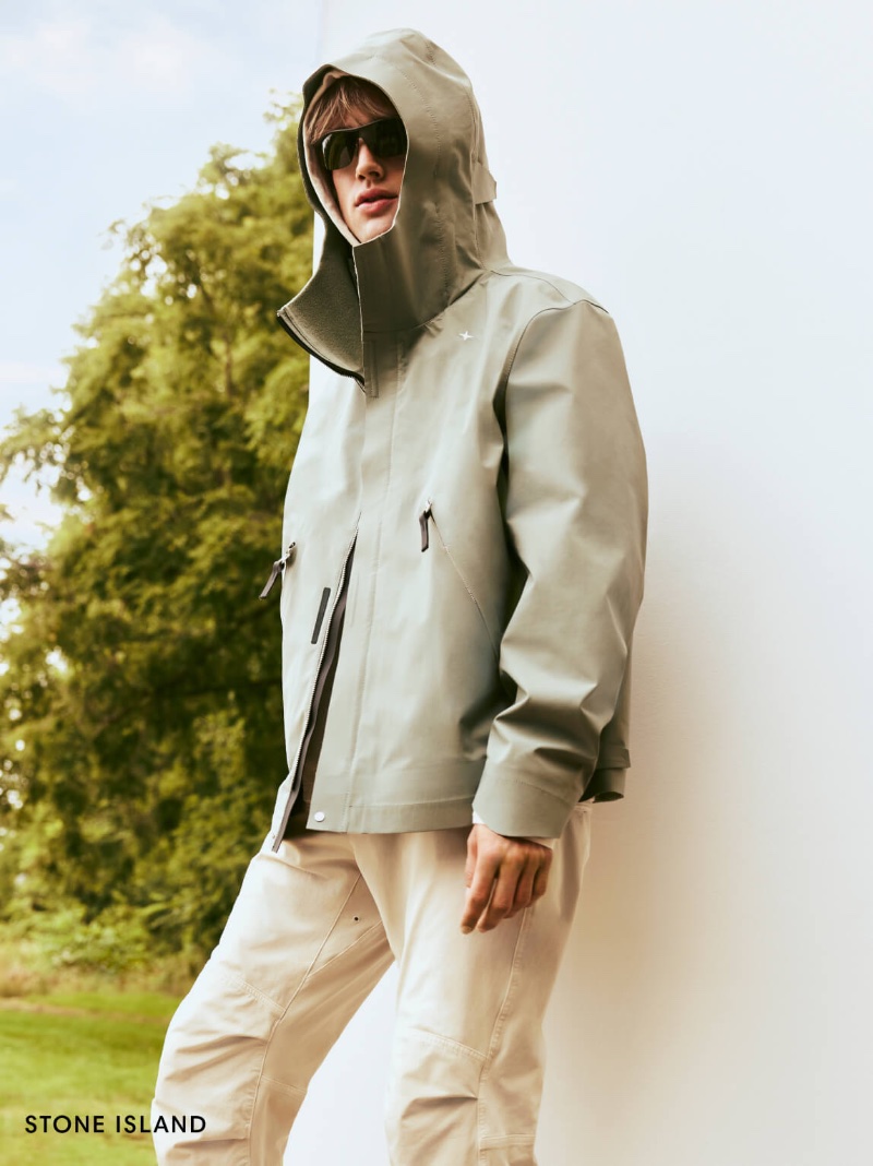 Sylvester Ulv wears a Stone Island hooded jacket.
