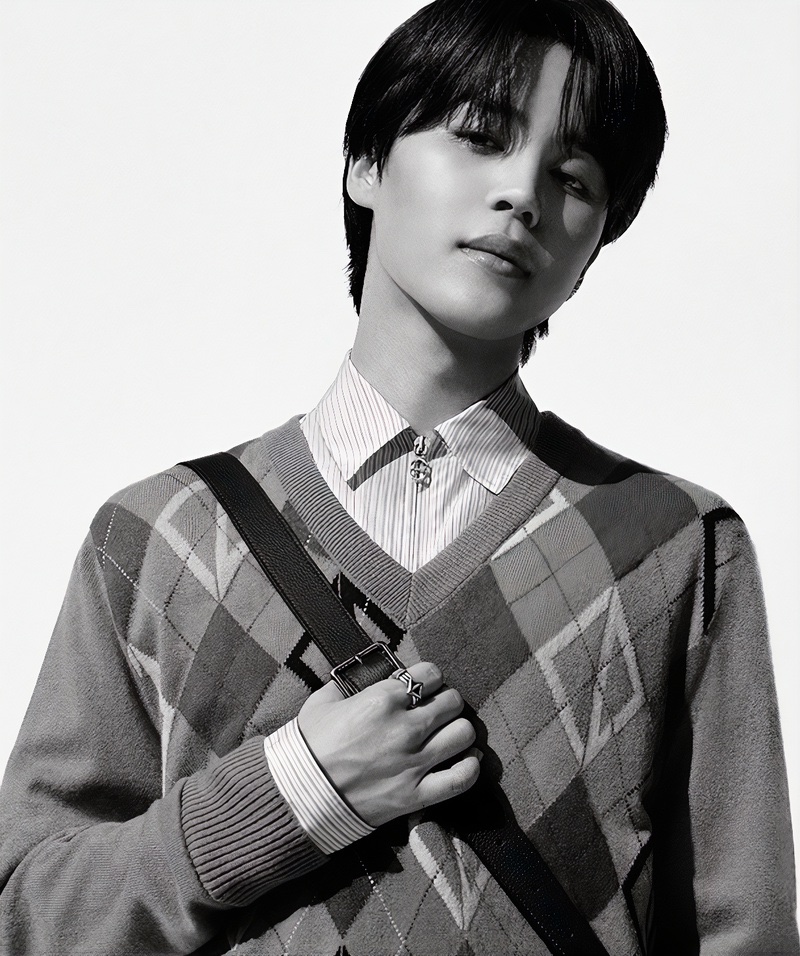 BTS member Jimin goes preppy in an argyle sweater for Dior Men's resort 2024 ad campaign. 