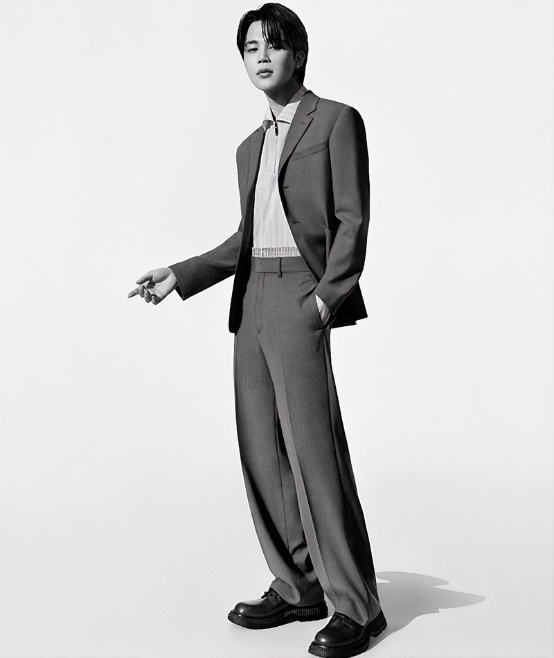 Suiting up for Dior's resort 2024 campaign, Jimin takes the spotlight in a black-and-white photo.