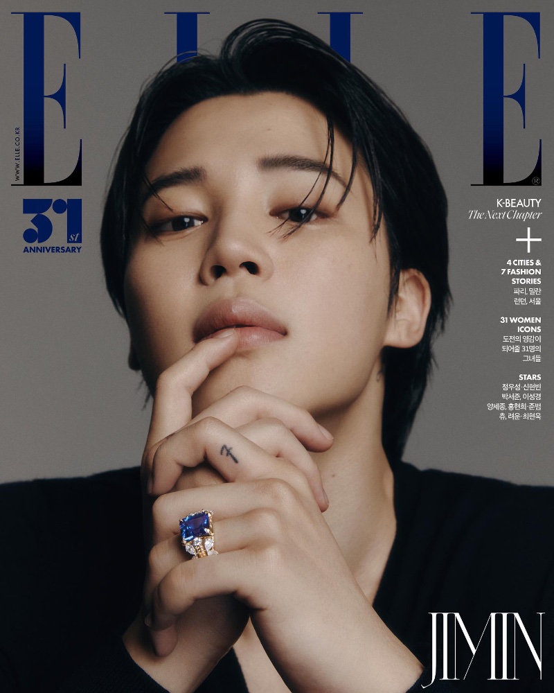 Covering Elle Korea's 31st anniversary issue, Jimin wears a Tiffany & Co. sapphire ring.